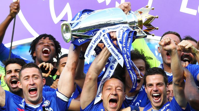 Gary Cahill and John Terry lift the Premier League trophy at Stamford Bridge