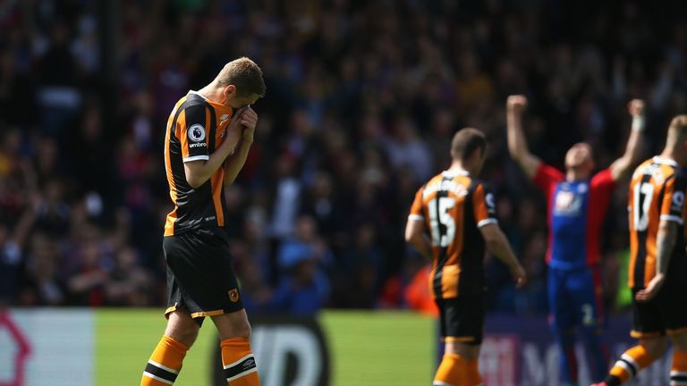 Michael Dawson of Hull City looks dejected as they are relegated to the Championship after the Premier League defeat at Crystal Palace