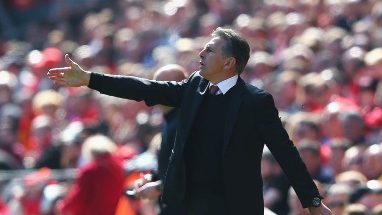 Claude Puel, Manager of Southampton gives his team instructions during the Premier League match between Liverpool and Southampton.