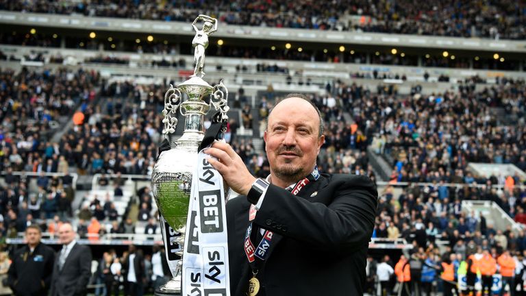  Rafael Benitez, Manager of Newcastle United celebrates with the Championship trophy