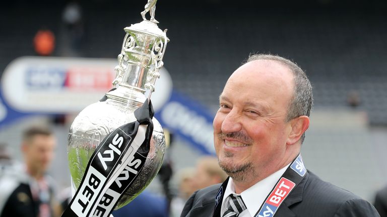 Rafa Benitez celebrates with the Sky Bet Championship trophy after the final game of the season