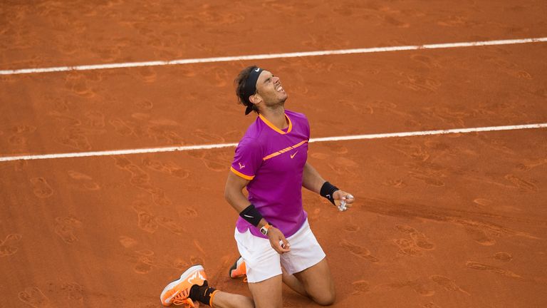 Rafael Nadal of Spain celebrates after beating Dominic Thiem in the Madrid Open final