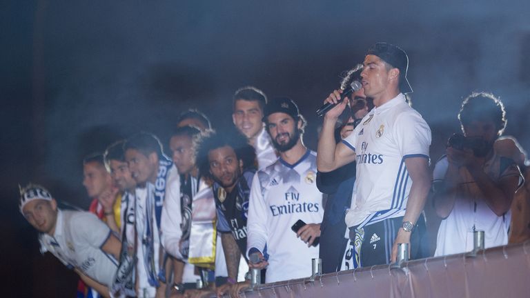 Cristiano Ronaldo of Real Madrid CF addresses fans during celebrations at Cibeles square after winning the La Liga title on May 21