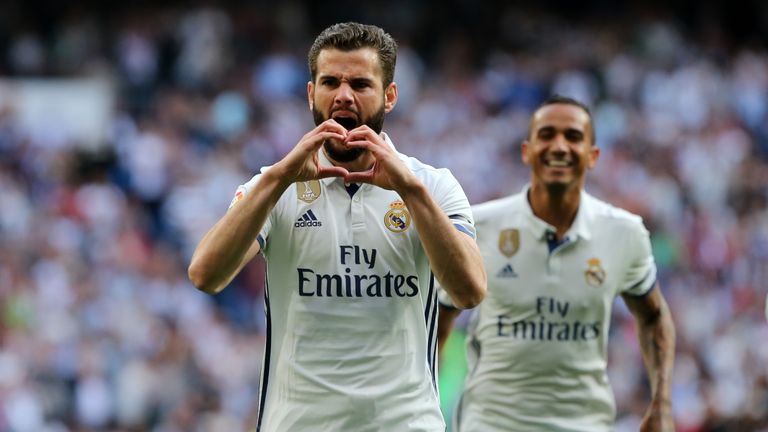 Real Madrid defender Nacho celebrates his goal 