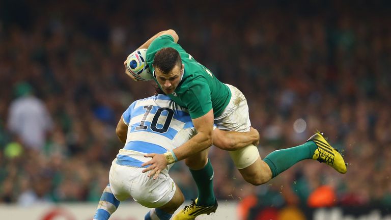 CARDIFF, WALES - OCTOBER 18:  Robbie Henshaw of Ireland is tackled by Nicolas Sanchez of Argentina during the 2015 Rugby World Cup Quarter Final match betw