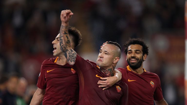 ROME, ITALY - MAY 14:  Radja Nainggolan with his teammate Stefan El Shaarawy of AS Roma celebrates after scoring the team's third goal during the Serie A m