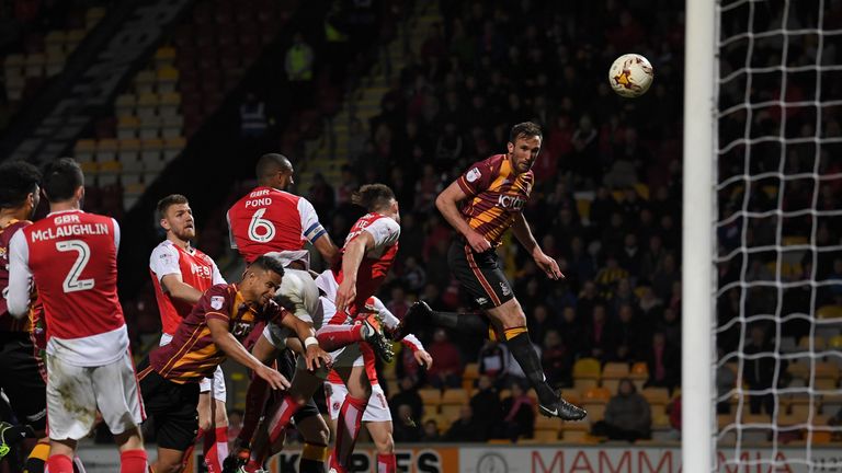 BRADFORD, ENGLAND - MAY 04:  Rory McArdle of Bradford City (R) scores their first goal during the Sky Bet League One playoff semi final, first leg match be