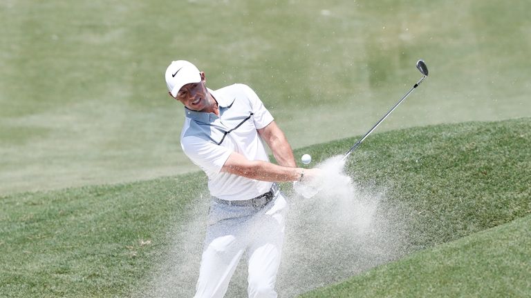 Rory McIlroy of Northern Ireland plays a shot from a bunker on the second hole during the first round of the THE PLAYERS Championship