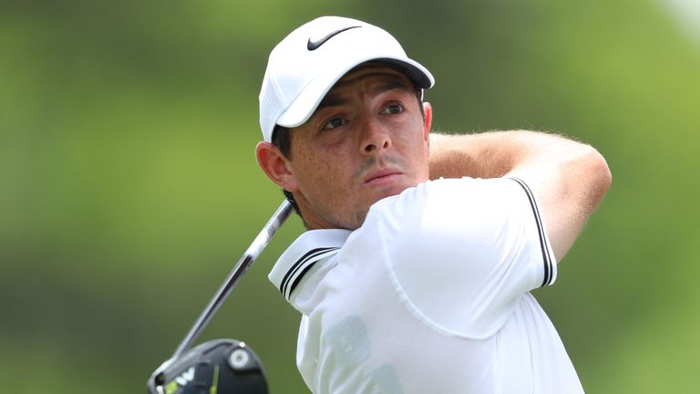 Rory McIlroy of Northern Ireland plays his shot from the ninth tee during the third round of THE PLAYERS Championship