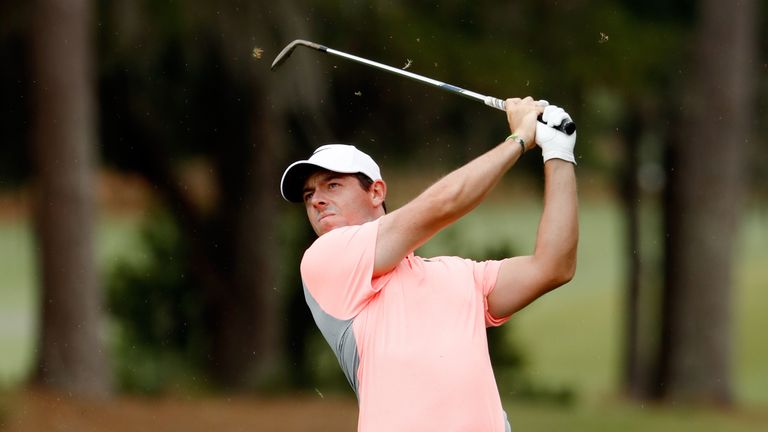Rory McIlroy of Northern Ireland plays a shot on the first hole during the final round of THE PLAYERS Championship