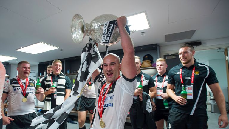 Danny Houghton celebrates with the Challenge Cup after Hull FC's victory over Warrington in 2016