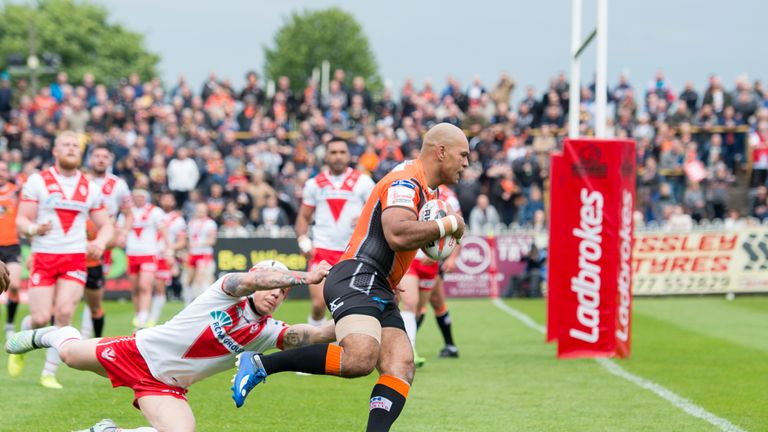 St Helens's Theo Fages is unable to prevent Jake Webster from scoring a try