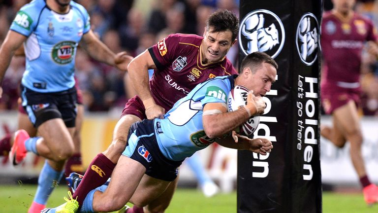 James Maloney scores the opening try during game one against Queensland