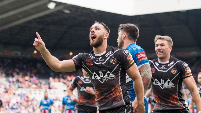 Luke Gale celebrates scoring the opening try