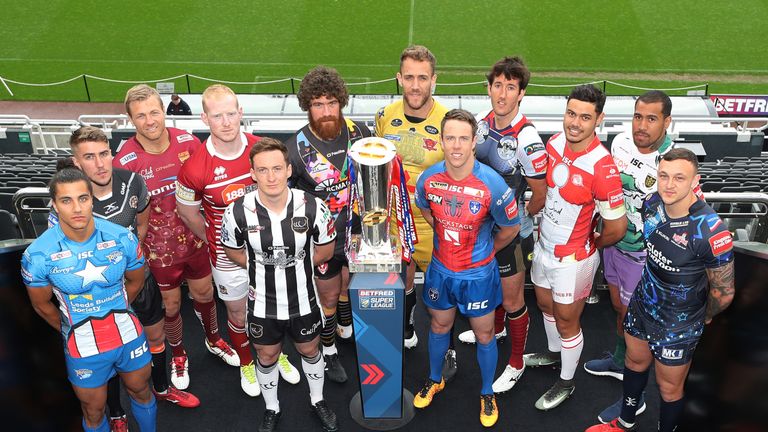 Players from the 12 Super League teams pose for photographs ahead of 2017 Magic Weekend