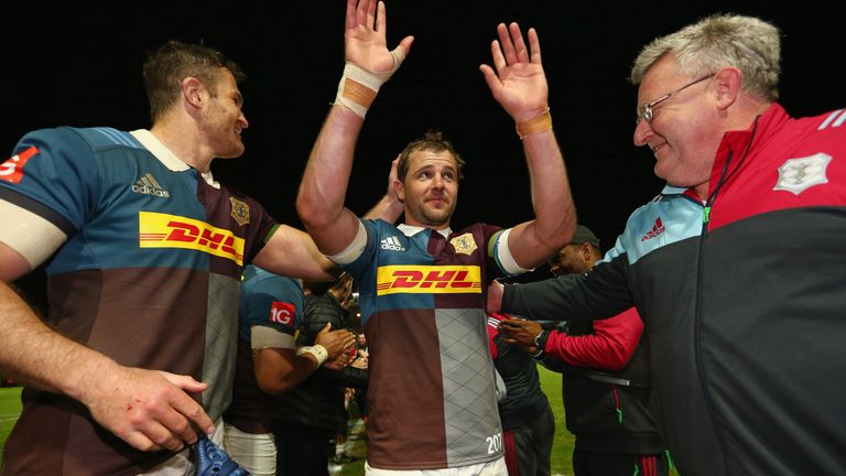Nick Evans is clapped from the field by his team-mates and the coaching staff after his final match at the Stoop