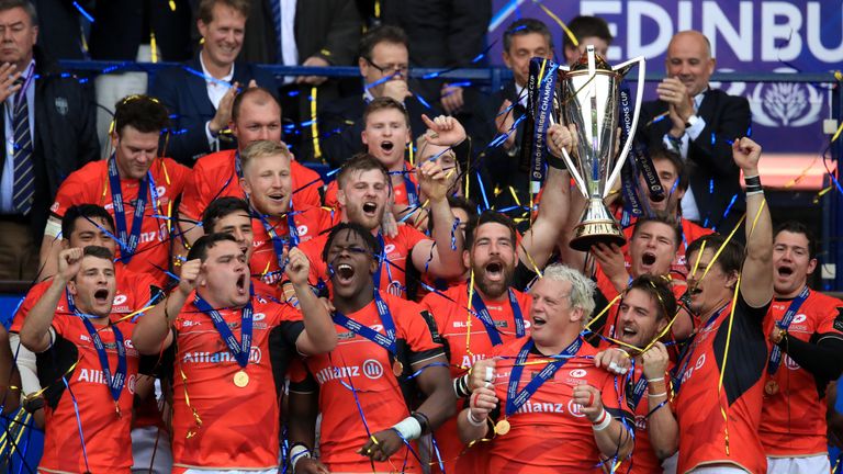 Saracens celebrate with the Champions Cup trophy