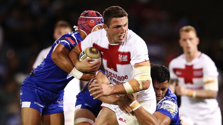 SYDNEy-MAY 06 2017: Sam Burgess of England is tackled by the Samoan defence during the 2017 Pacific Test Invitational match between England and SamOA