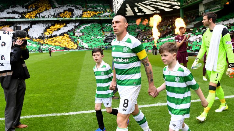 Celtic captain Scott Brown leads out the side