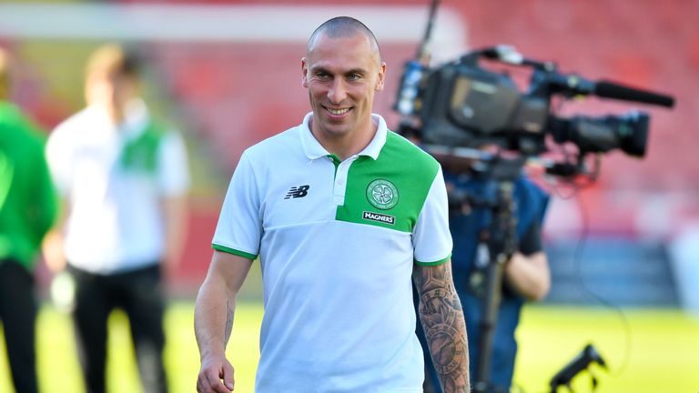 Celtic's Scott Brown steps onto the pitch at Firhill pre-match