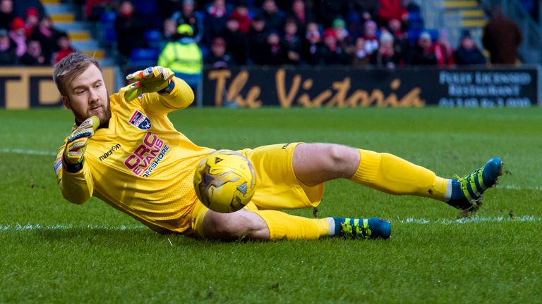 Goalkeeper Scott Fox in action for Ross County.