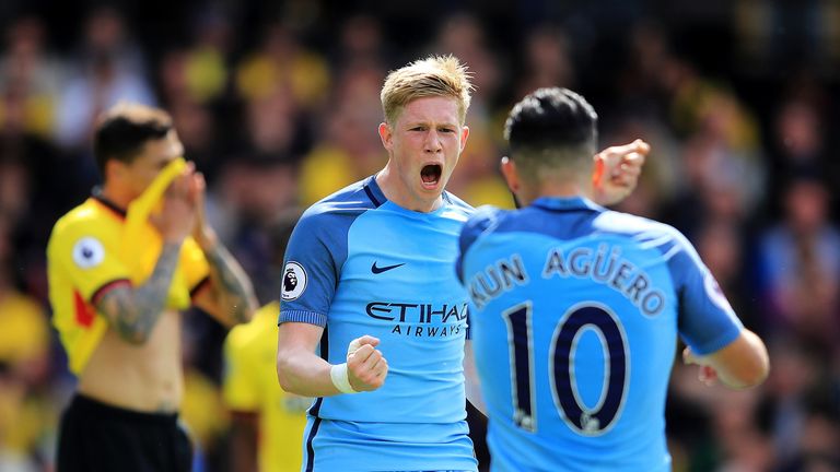 Sergio Aguero celebrates his first goal with Kevin De Bruyne