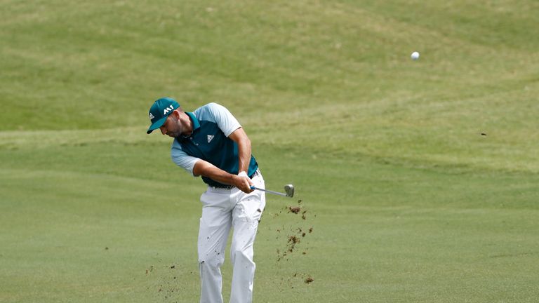 Sergio Garcia of Spain plays a shot on the fourth hole during the third round of THE PLAYERS Championship