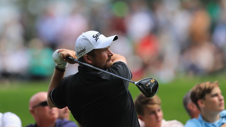 Shane Lowry of Ireland tees off on the third hole during day four of the BMW PGA Championship at Wentworth