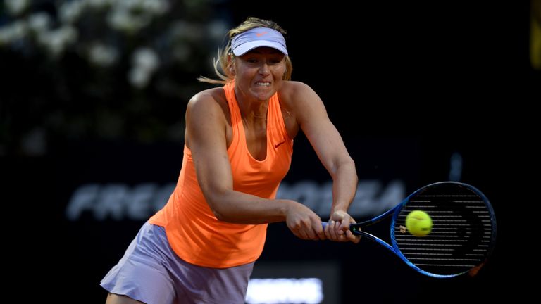 ROME, ITALY - MAY 16:  Maria Sharapova of Russia plays shot during her second round match against Miriana Lucic-Baroni of Croatia in The Internazionali BNL