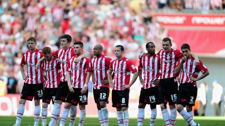 LONDON, ENGLAND - MAY 26:  Dejection for players of Sheffield United during the npower League One, playoff final between Huddersfield Town and Sheffield Un