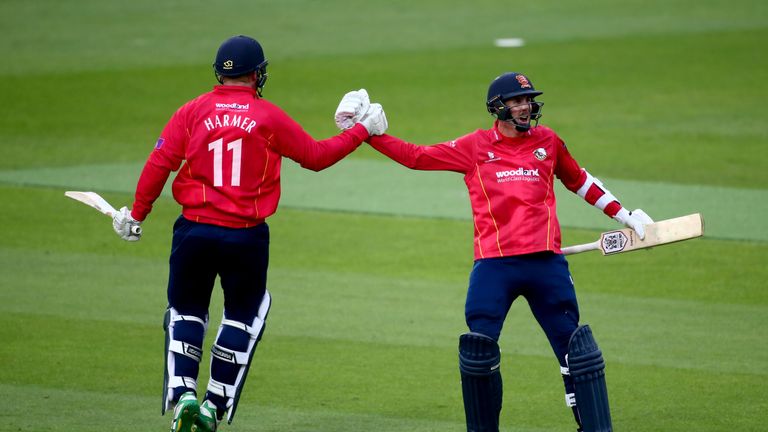 Simon Harmer and Matthew Quinn after seeing Essex to a thrilling one-wicket win over Surrey