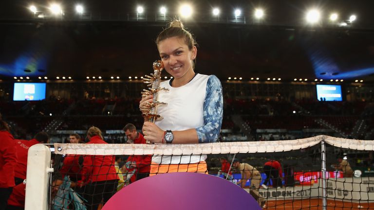 Simona Halep of Romania with the trophy after the Madrid Open final