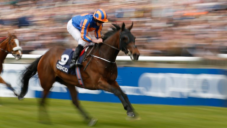 Somehow ridden by Ryan Moore wins the Charm Spirit Dahlia Stakes at Newmarket