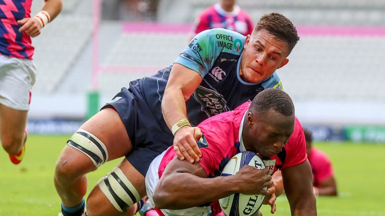 Stade Francais vs Cardiff Blues.Stade Fran..ais' Sekou Macalou scores his sides fourth try despite Ellis Jenkins of Cardiff Blues