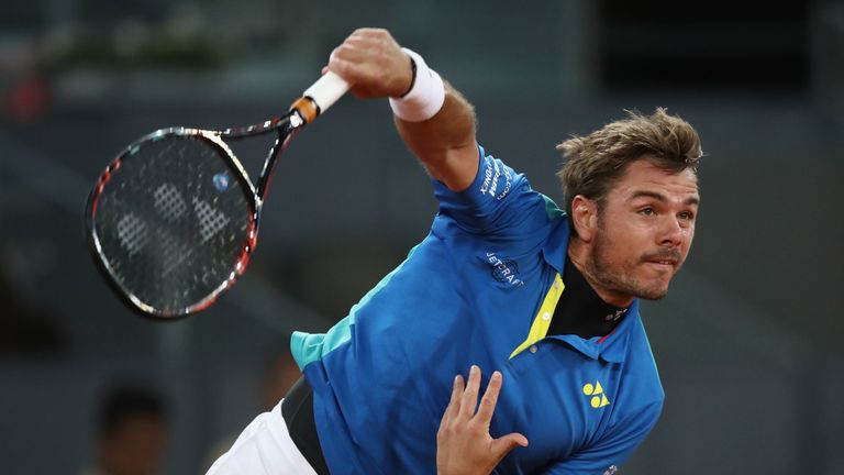 Stanislas Wawrinka of Switzerland in action against Benoit Paire of France during day five of the Mutua Madrid Open tennis at La Caja Magica