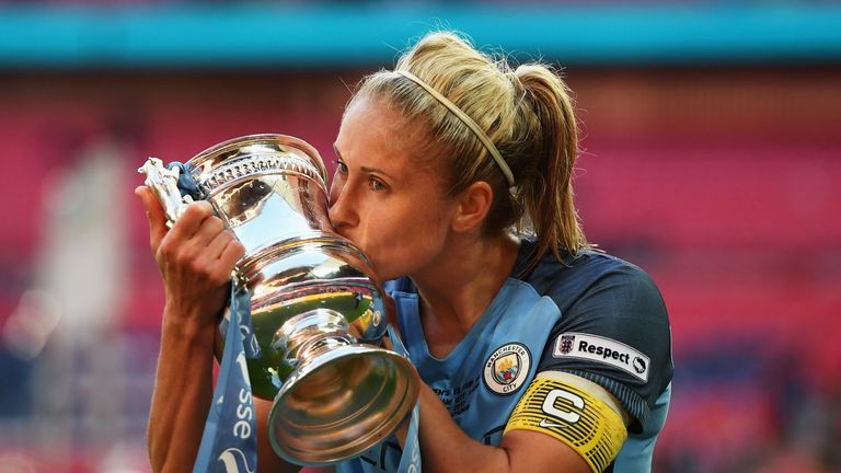 Steph Houghton kisses the trophy after the SSE Women's FA Cup Final