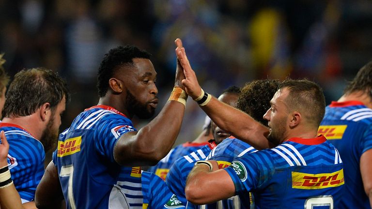 CAPE TOWN, SOUTH AFRICA - MAY 19: Siya Kolisi (c) of the Stormers and Dewaldt Duvenage of the Stormers celebrate the try during the Super Rugby match betwe