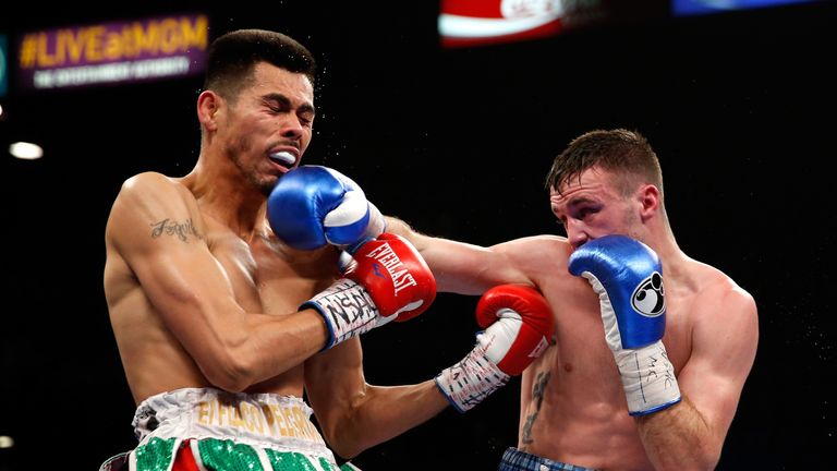 Taylor (R) connects with a punch on Alfonso Olvera during January's super lightweight fight in which Taylor won by unanimous decision