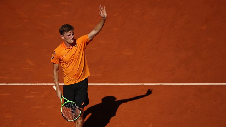 David Goffin of Belgium celebrates defeating Karen Khachanov of Russia during day two of the Mutua Madrid Open