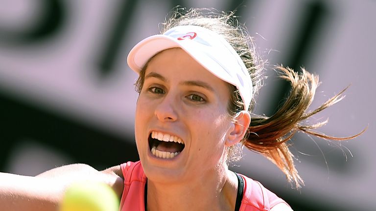 Britain's Johanna Konta eyes the ball during her match against US's Venus Williams at the WTA Tennis Open tournament