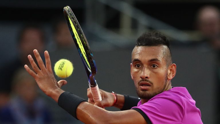 Nick Kyrgios of Australia plays a forehand in his match against Rafael Nadal of Spain during day six of the Mutua Madrid Open