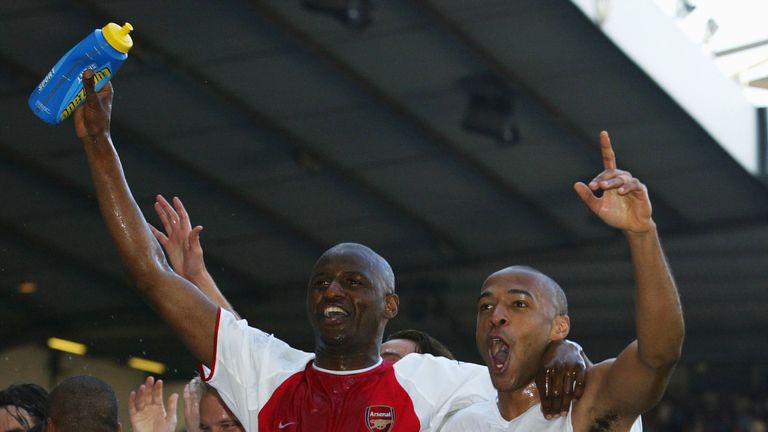 Thierry Henry and Patrick Viera celebrate winning the PL title at White Hart Lane