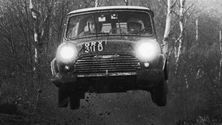 British car of the sixties, the Austin Morris Mini, driven by Finnish rally driver Timo Makinen.   (Photo by Evening Standard/Getty Images)