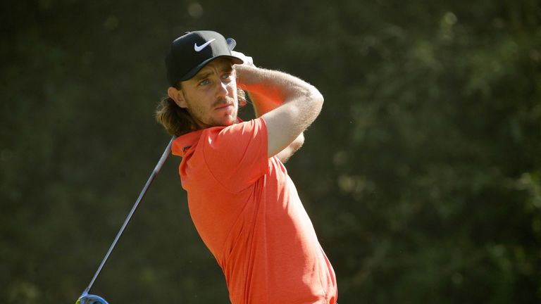 Tommy Fleetwood of England plays his shot from the 11th tee during the first round of the THE PLAYERS Championship