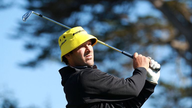 PEBBLE BEACH, CA - FEBRUARY 09:  Tony Romo of the Dallas Cowboys watches his tee shot on the 17th hole during the third round of the AT&T Pebble Beach Nati