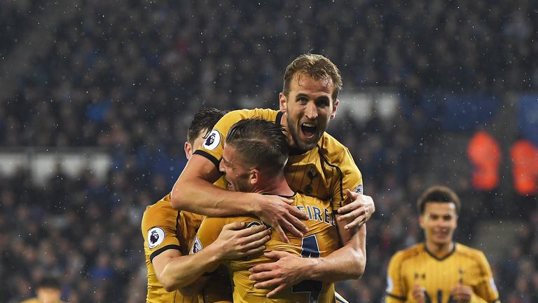 Harry Kane of Tottenham Hotspur (C) celebrates as he scores their third goal with team mates during the Premier League match 