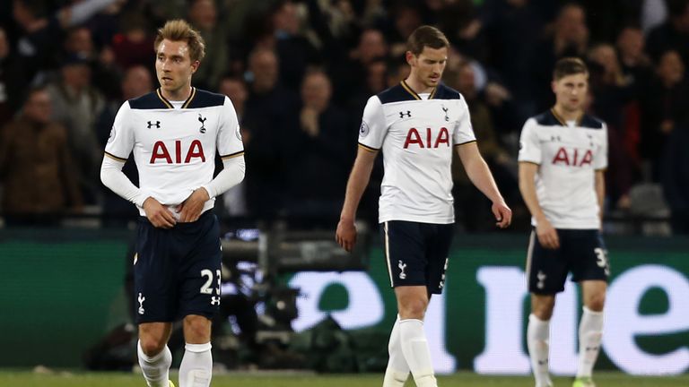 Tottenham Hotspur's Danish midfielder Christian Eriksen (L), Tottenham Hotspur's Belgian defender Jan Vertonghen and Tottenham Hotspur's Welsh defender Ben