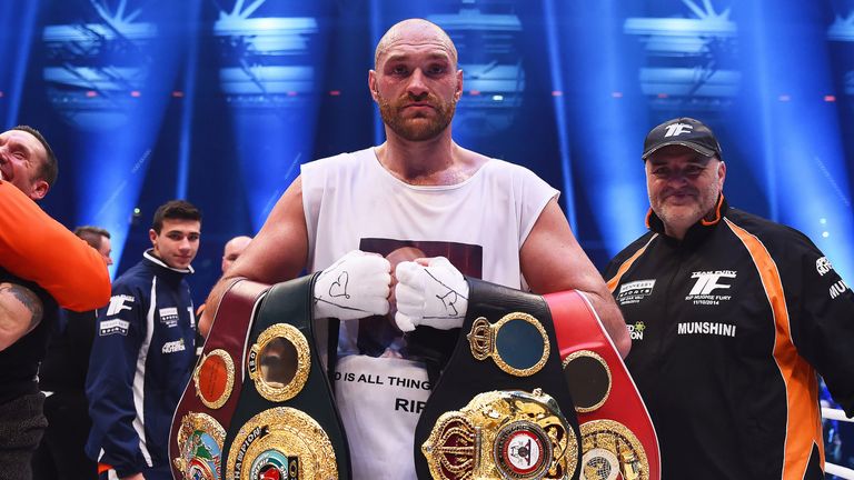 Tyson Fury celebrates after defeating Wladimir Klitschko to become World Heavyweight Champion on November 28, 2015