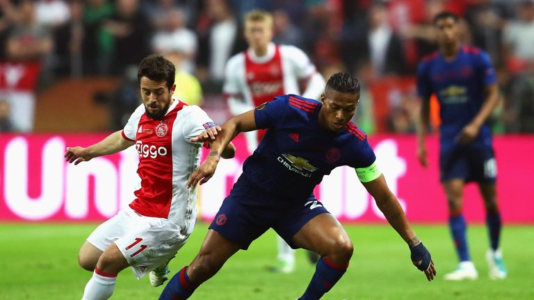 STOCKHOLM, SWEDEN - MAY 24: Amin Younes of Ajax puts pressure on Antonio Valencia of Manchester United during the UEFA Europa League Final between Ajax and