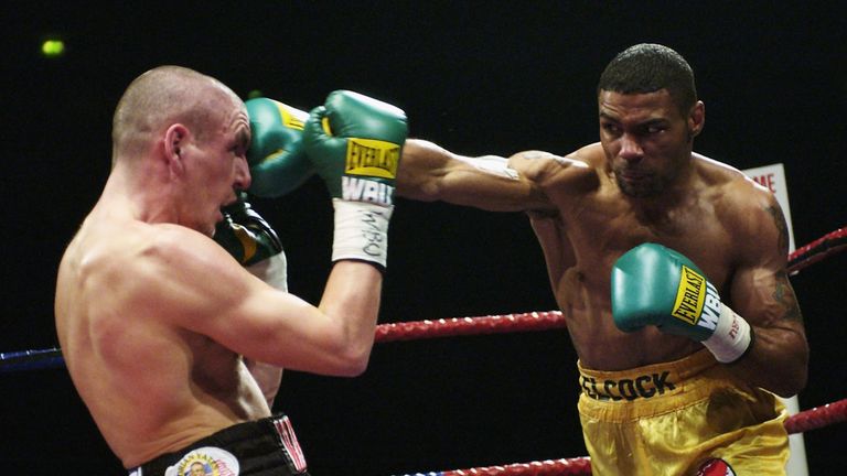 Wayne Elcock of England lands a straight right on Anthony Farnell of England during the WBU Middleweight Championship fight